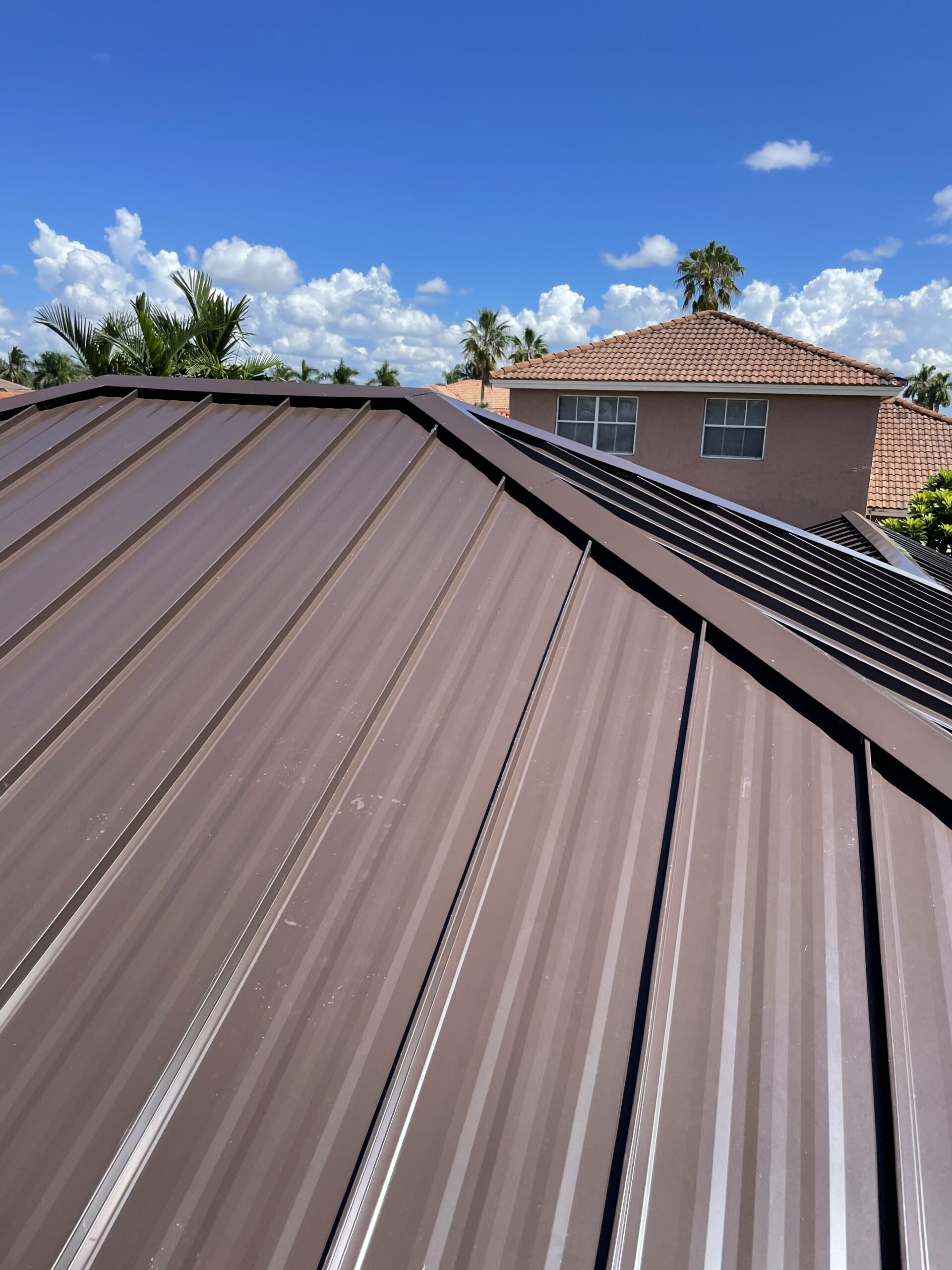 Brown Metal Roof Under Blue Sky
