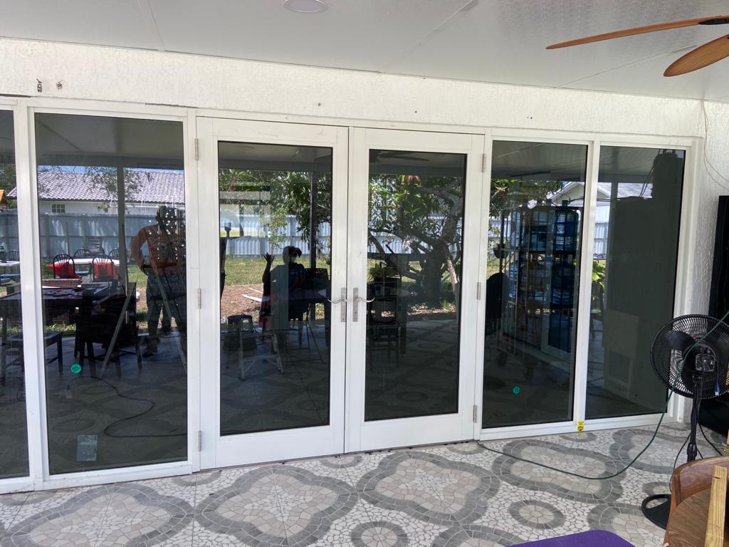 White-Framed Glass Patio Doors