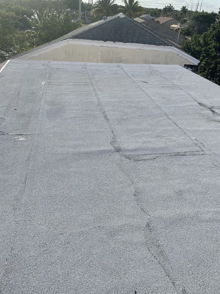 Low-slope roof surface with visible seams