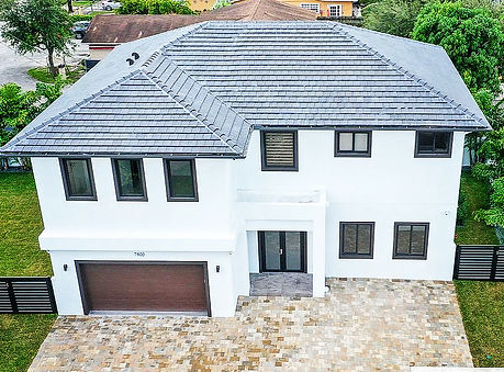 Roof maintenance in Miami, FL — residential roofing system
